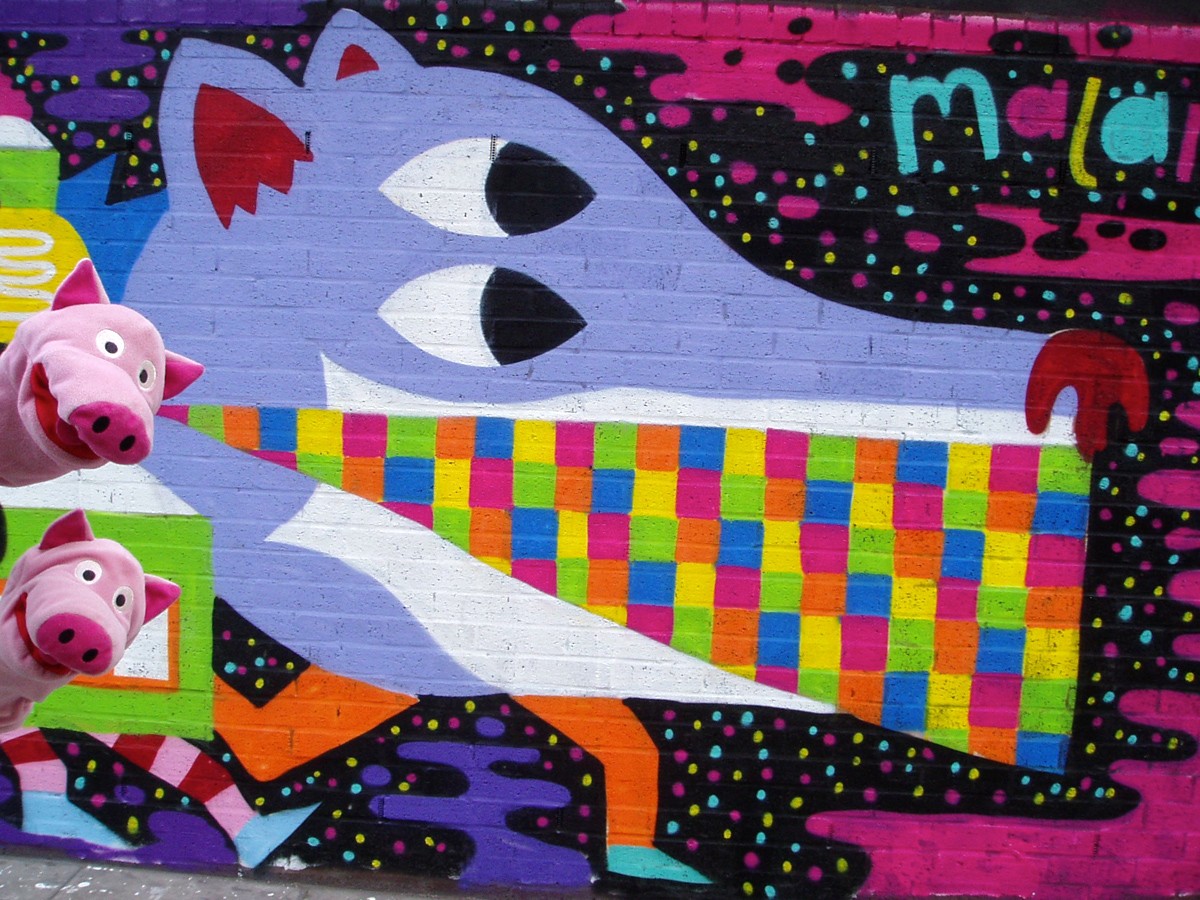Kunst in der Brick-Lane, farblich zu den Schweinen passend.